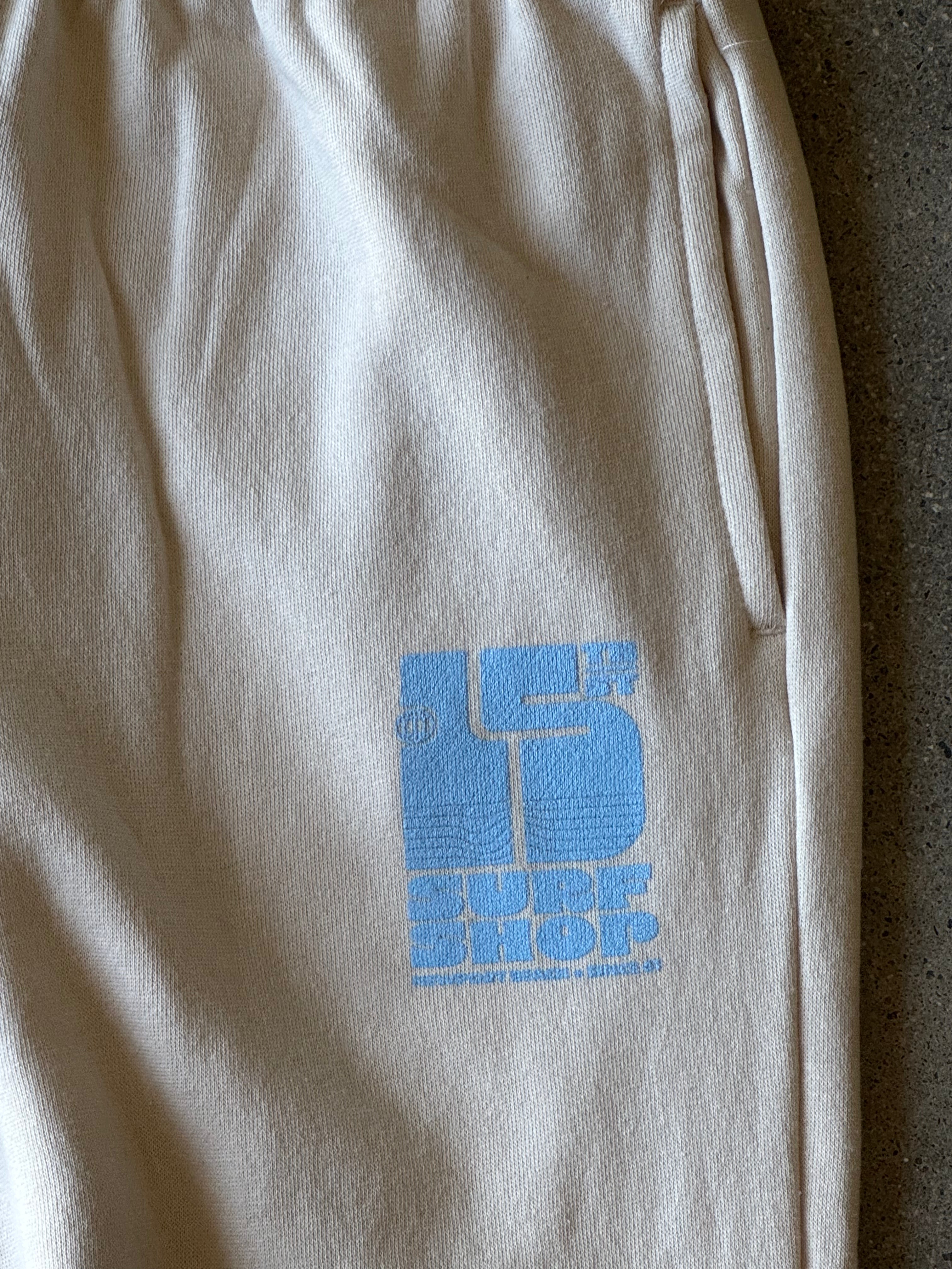 15th St WOMEN'S Groovy Drip Wide Leg Sweatpants BABY BLUE on SAND