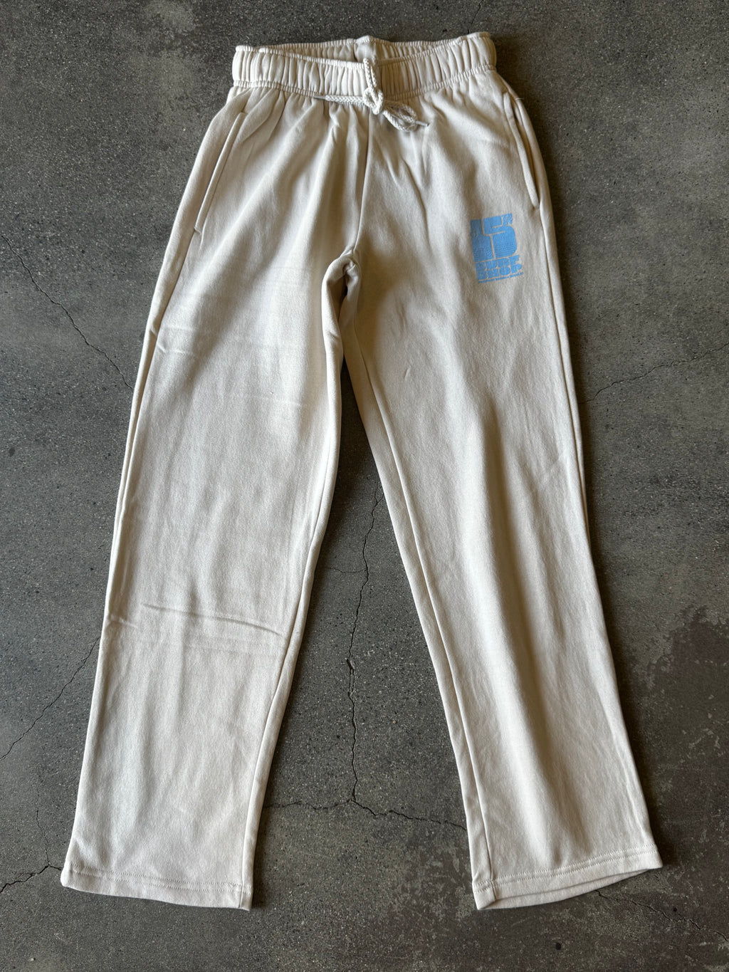 15th St WOMEN'S Groovy Drip Wide Leg Sweatpants BABY BLUE on SAND